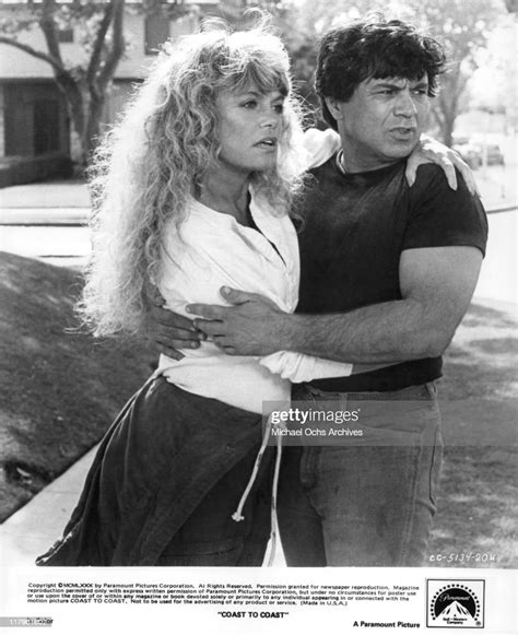 Dyan Cannon Holds Onto Robert Blake In A Scene From The Film Coast