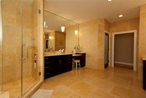 Stone bathroom tile is durable and versatile. Jerusalem_Gold_Limestone_Bathroom | Gold tiles bathroom ...
