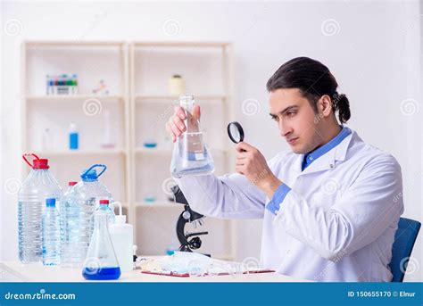 Young Male Chemist Experimenting In Lab Stock Photo Image Of