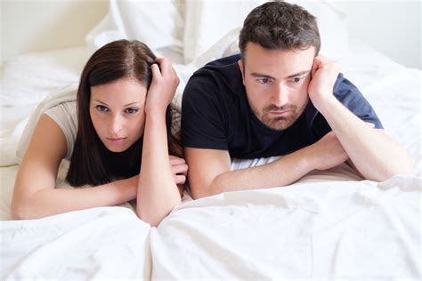 Worried and bored lovers couple after a fight lying in bed - Fitness & Wellness News