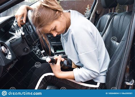 Drunk Young Woman Sitting Behind Wheel Of Car Fall Asleep While