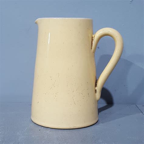 Yellow Ceramic Jug Tramps Prop Hire