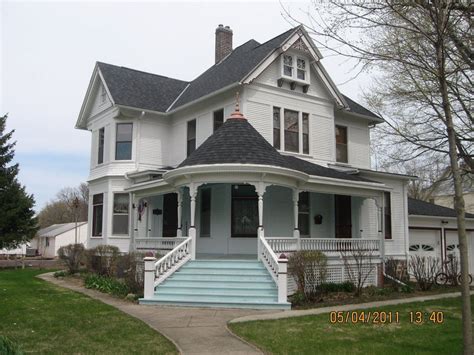 Beautiful White Eastlake Queen Anne Victorian Style House With L Shaped