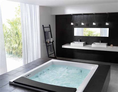 Jacuzzi is a brand name, and whirlpool tub is a generic name. Home Design: Whirlpool Bathtubs
