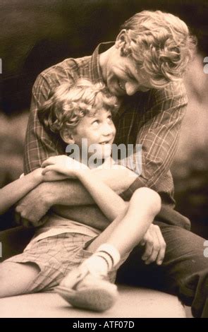 Father And Son Share Tender Moment Stock Photo Alamy
