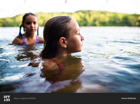 Young Girls Swimming In A Lake Stock Photo Offset
