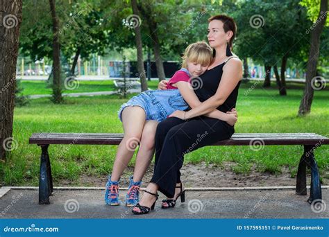Mother And Daughter Sitting On A Bench In The Park Stock Image Image Of Leisure Nature 157595151
