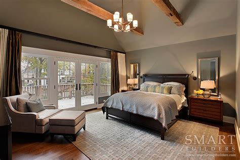 Master bedroom with exposed roof trusses, shiplap walls, and carpet over hardwood flooring. Contemporary Craftsman Custom Home Photo Gallery - SMART ...