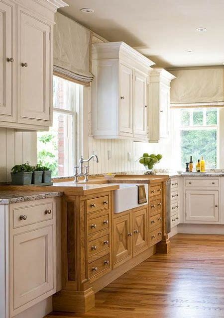 White Cabinets Mixed With Wood Cabinets In Kitchen Kitchen Sink Decor