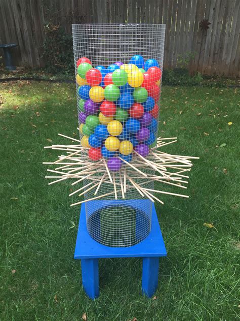 This lawn game for adults consists of two boards covered with nonskid fabric, along with eight beanbags, and even a carrying case for easy transportation and storage. Giant Kerplunk game for the yard. Fun for kids and adults ...