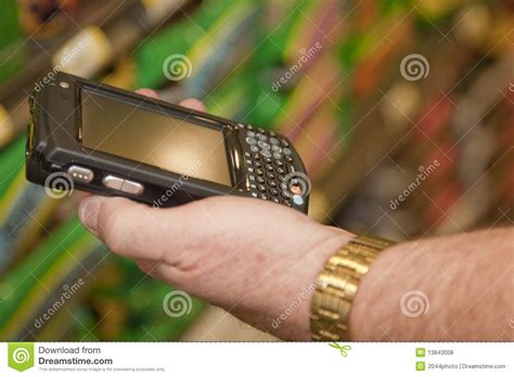 Checking Messages On A Wireless Device Stock Photo Image Of