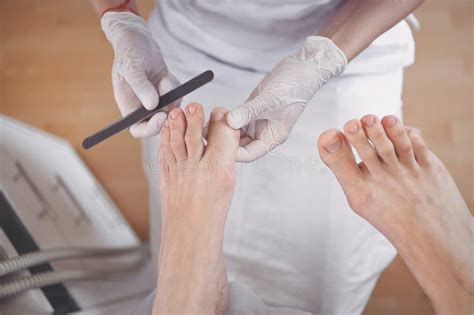 Podiatry Procedure With Pedicure Machine Care Of The Feet Stock Image