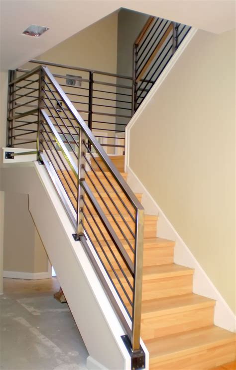 Modern Neutral Wooden Staircase With Minimalist Steel Railing