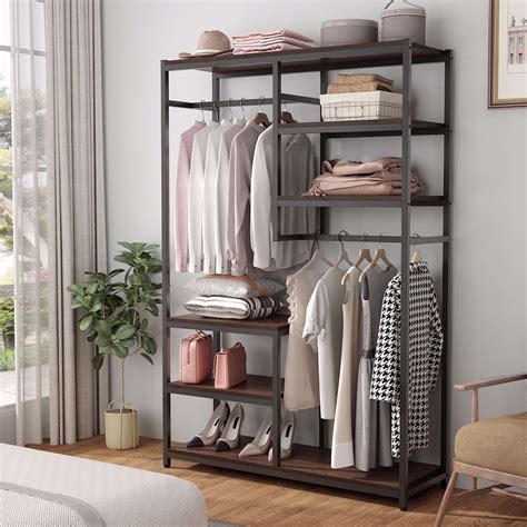 The whitmor 4 section fabric closet organizer has four cubbies and an additional clothing rod to hang shirts, dresses, and slacks. Tribesigns Free Standing Closet Organizer, Double Hanging ...