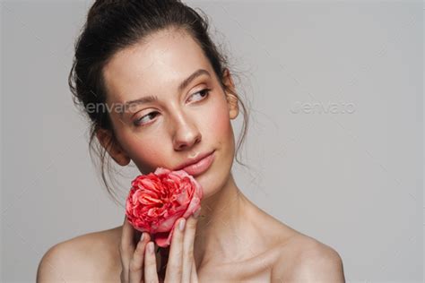Beautiful Half Naked Woman Posing With Flower On Camera Stock Photo By