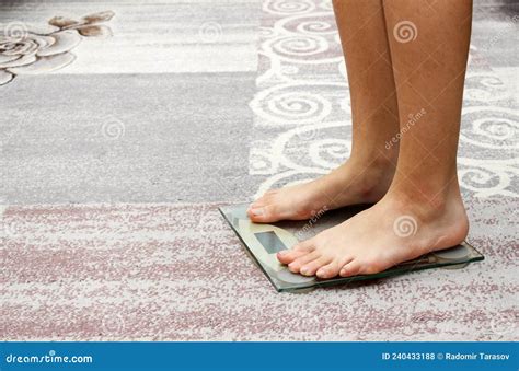 Legs Of A Girl Standing On The Scales Stock Photo Image Of Care