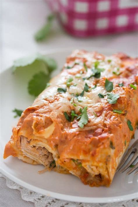 We have the easiest sour cream chicken enchiladas recipe packed with chicken, cheese and sour cream sauce. Sour Cream Chicken Enchiladas