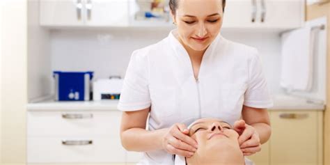 Professional Beautician In The Beauty Spa Making A Facial Massage The