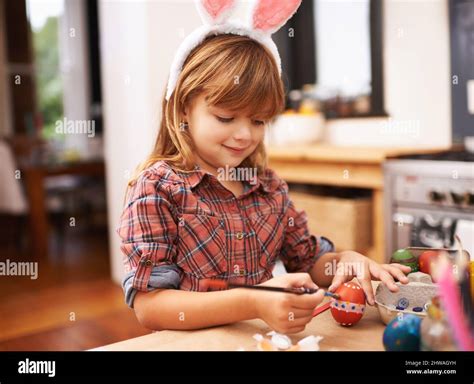 Thats An Eggcelent Artwork Shot Of A Smiling Little Girl Painting An