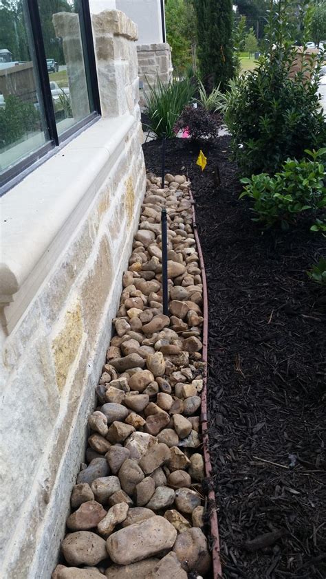 This was a drainage solution for the basement and it was pretty to have the house surrounded by white gravel and then green grass. landscaping to prevent termites - Google Search | Backyard ...