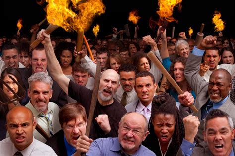 Diverse Angry Mob With Weapons Torches Pitchforks Wtfstockphotos