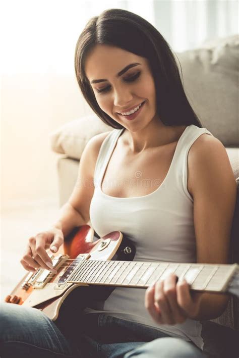 Beautiful Woman Playing Guitar Stock Photo Image Of Living Comfort