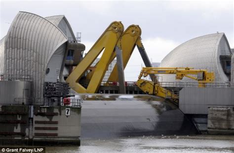 Warnings fresh storms set to hit uk, as waterlogged hospital cancels all operations. Thames Barrier shuts for the first time in two years to ...