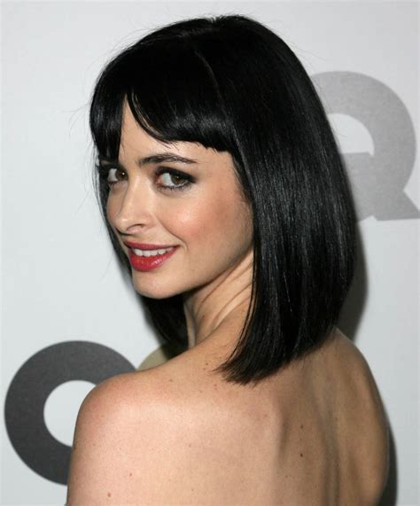 Krysten Ritter With Her Hair In A Cleopatra Bob That Covers The Neckline
