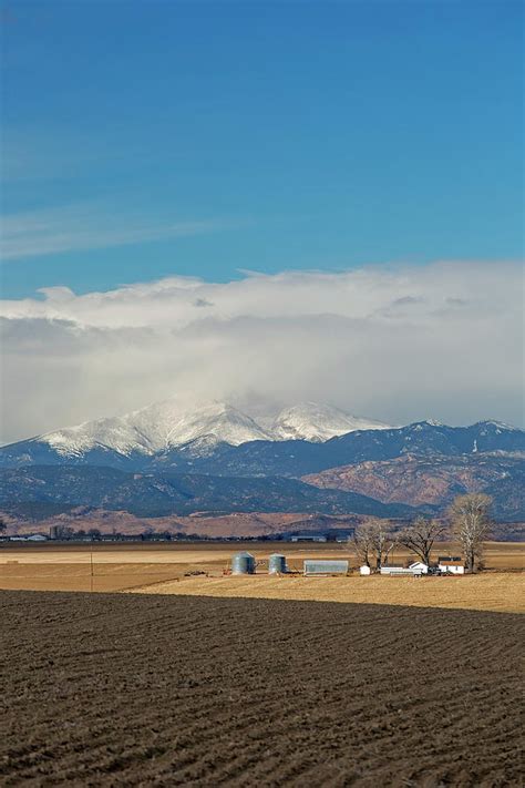 Farmland Below The Rocky Mountains Photograph By Jim West Fine Art