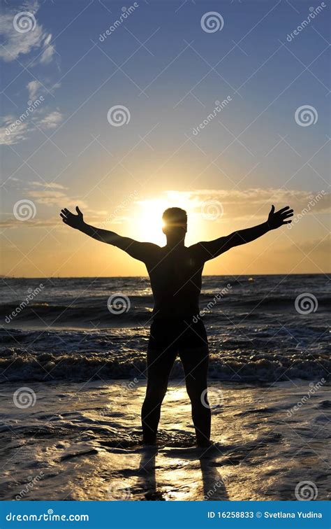 Silhouette Of A Man With Outstretched Arms Stock Image Image Of