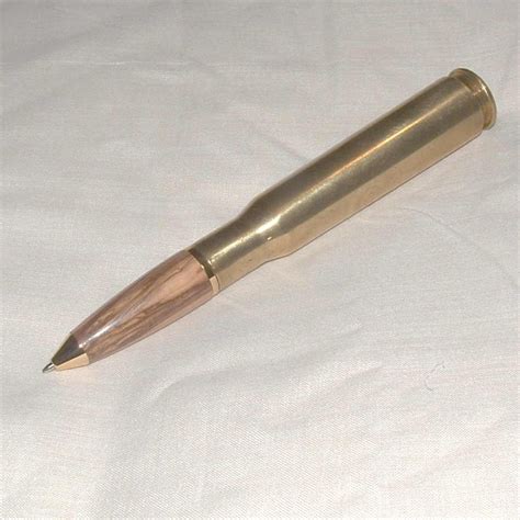 Black 50 cal bmg military brass bullet bottle cap opener 50 caliber. 50 Cal Machine Gun Bullet