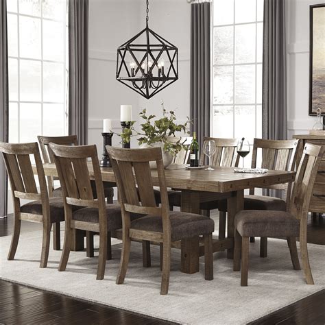 Signature Design By Ashley 9 Piece Dining Set And Reviews Wayfair