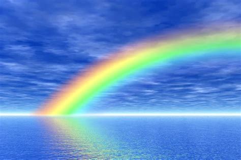 Rainbow In The Sea Stock Photo By ©suravid 9257300