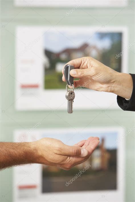 Handing Over Keys To New Owner — Stock Photo © Monkeybusiness 4841439