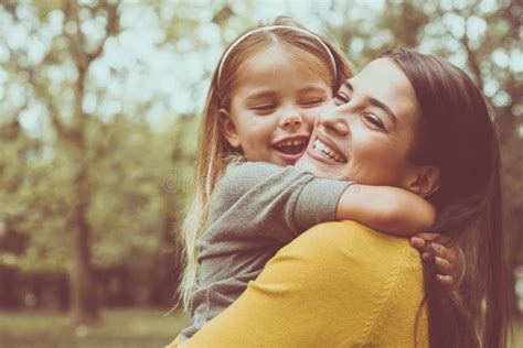 Mother And Daughter Hugging Front View Stock Image Image Of Emotion Meadow 105513907