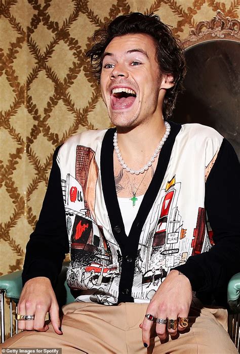 Harry Styles Wears A Pearl Necklace And Sports Red And Black Nail Varnish At La Event Daily