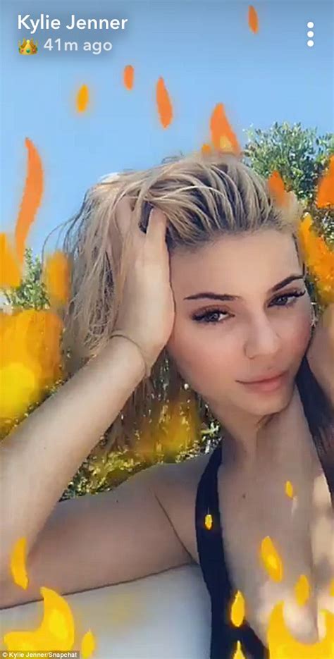 Kylie Jenner Flashes Cleavage In Low Cut Swimsuit As She Enjoys Sunday