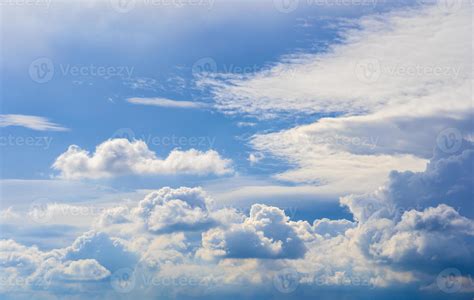 The Sky Is Bright Blue With Beautiful Fluffy Clouds Blue Sky With