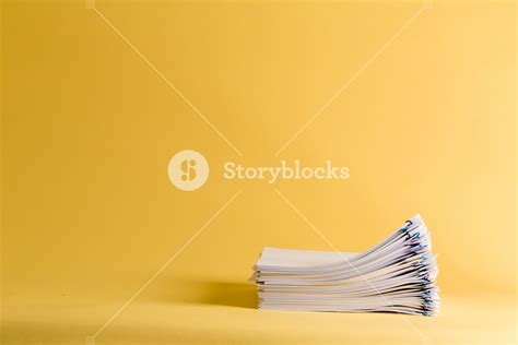 Pile Of Papers Organized With Paper Clips Royalty Free Stock Image