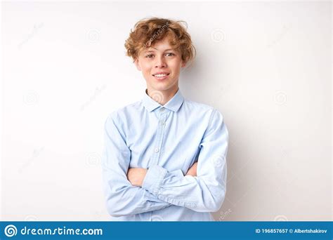 Portrait Of Smiling Young Boy 14 Years Old Isolated Over White