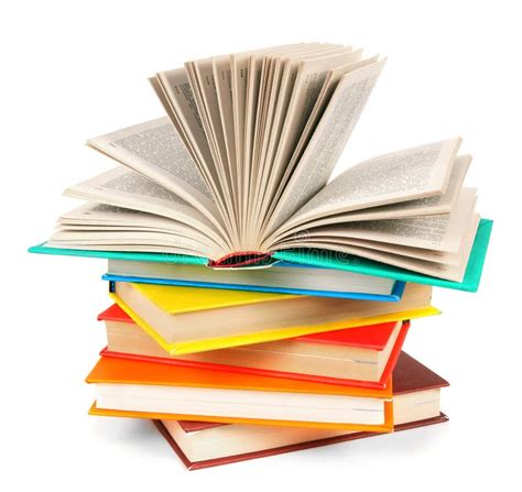 The Open Book On A Pile Of Multi Coloured Books Stock Photo Image Of