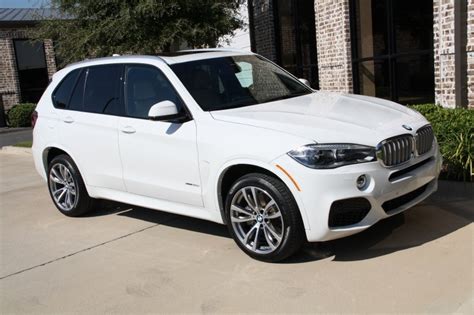 And up to 26 mpg hwy. 2014 BMW X5 xDrive50i M Sport, 4.4L DOHC V8 32v Twin Turbo, Alpine White | Best Suv Site