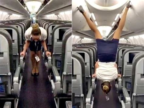 Woman Flight Attendant Does A Flip To Close Overhead Cabin Bins Watch Video