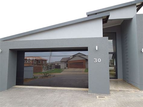 Steel garage doors are naturally insulated better than wooden garage doors. Contemporary Garage Doors - Emil Garage Doors, Sales & Repair