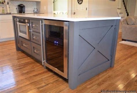 White on white on white it the current. Custom kitchen island with built in wine fridge! Built by ...