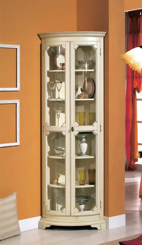 Images of corner showcase designs are filled with stylish and quality material. Corner showcase with decorative trim in a classic style ...