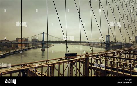 A Look From Brooklyn Bridge To Manhattan Bridge Over Hudson River In