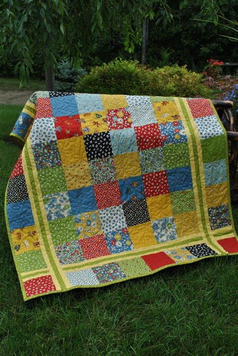 PDF Quilt Pattern.....Charm square Layer Cake or Fat Quarter See more ideas about charm pack quilt, charm pack quilt white sashing between colorful charm squares makes the whimsical charm pack baby quilt especially bold.