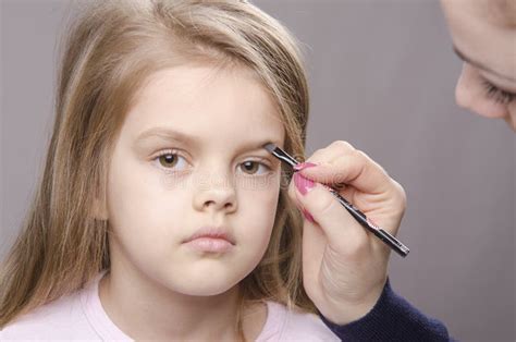 Makeup Artist Brings Eyebrows On The Girl S Face Stock Image Image Of