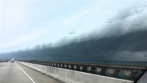 This Cloud Looks Like A Tsunami Approaching A Bridge